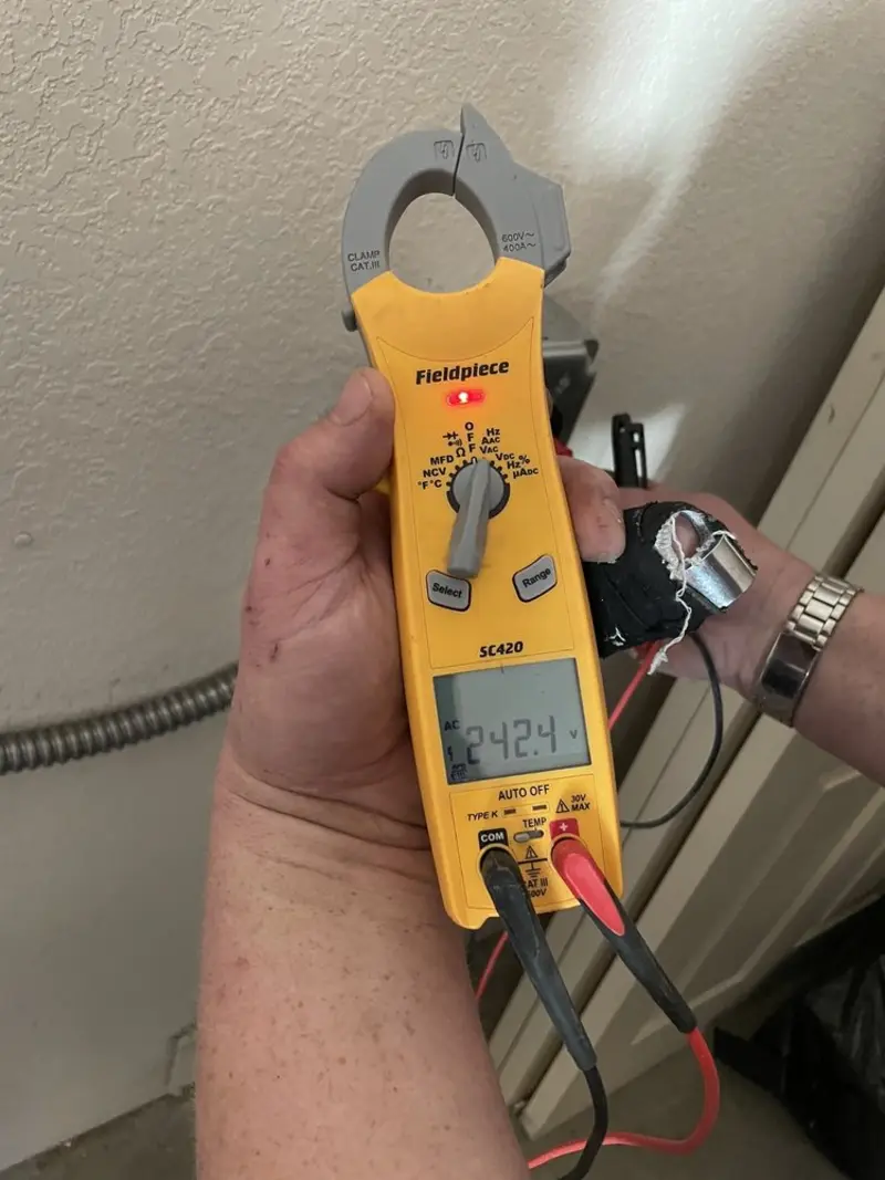Voltage testing with clamp meter during Aluminum Wiring Replacement in Greece